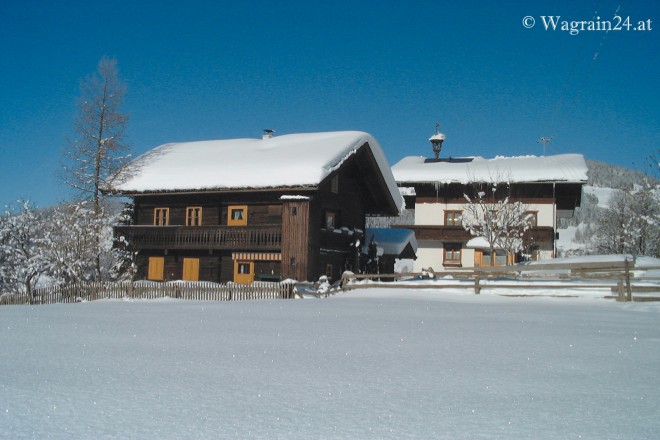 Foto Ferienhaus und Appartementhaus im Winter