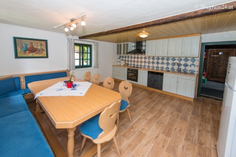 Foto Küche mit Essecke im Ferienhaus
